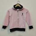 Pink hoodie with black trim on a hanger against a white background